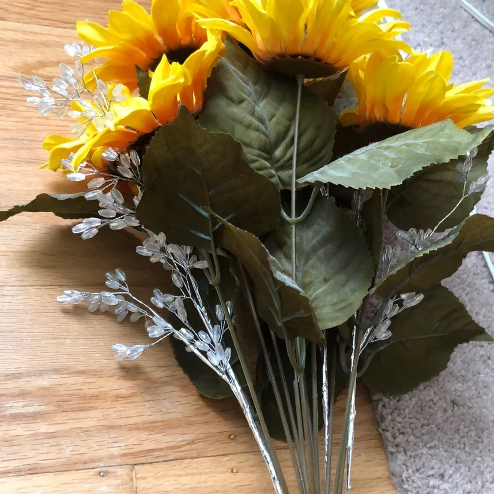 Faux sunflower florals with jewels in milk jar